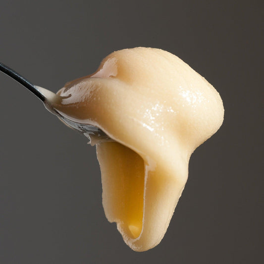 whipped honey on a spoon